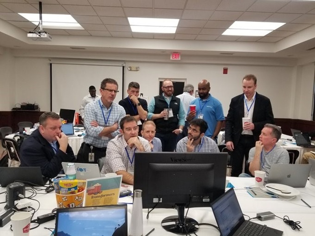 The Town of Cary team working in a conference room with Microsoft and SAS resources.