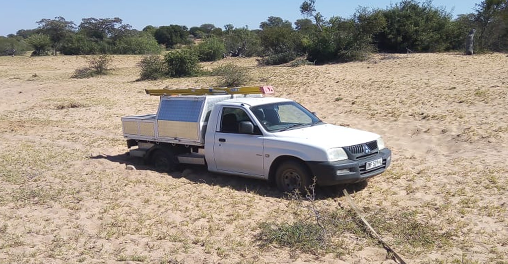On the “road” to a connected cooler in rural South Africa, a field technician gets stuck in the sand on his way to the tavern