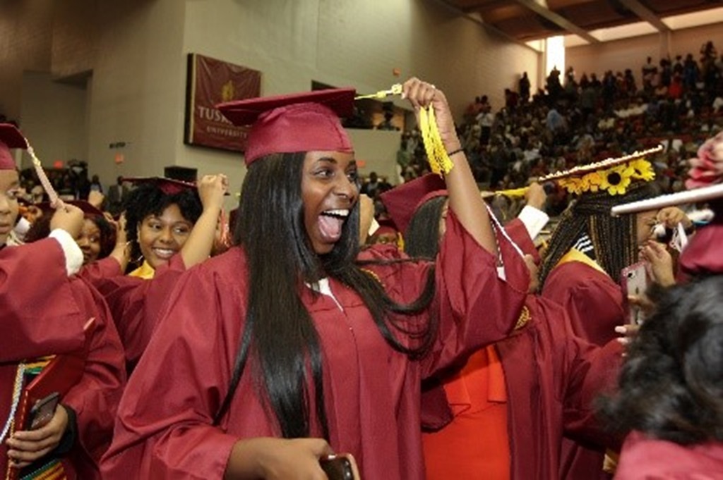 Graduating Tuskegee University students celebrate the completion of their studies despite the circumstances and challenges.